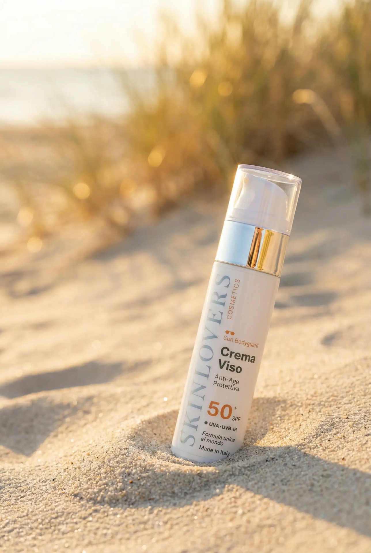 Flacone Crema Viso SPF 50+ su pietra al sole